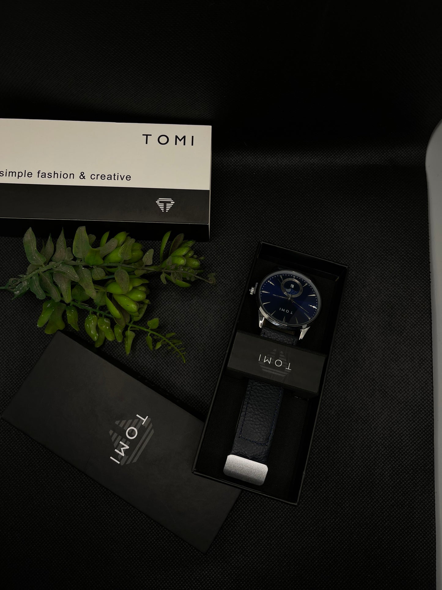 TOMI METALLIC BLUE DIAL WITH BLUE LEATHER STRAP IN MAGNETIC LOCK