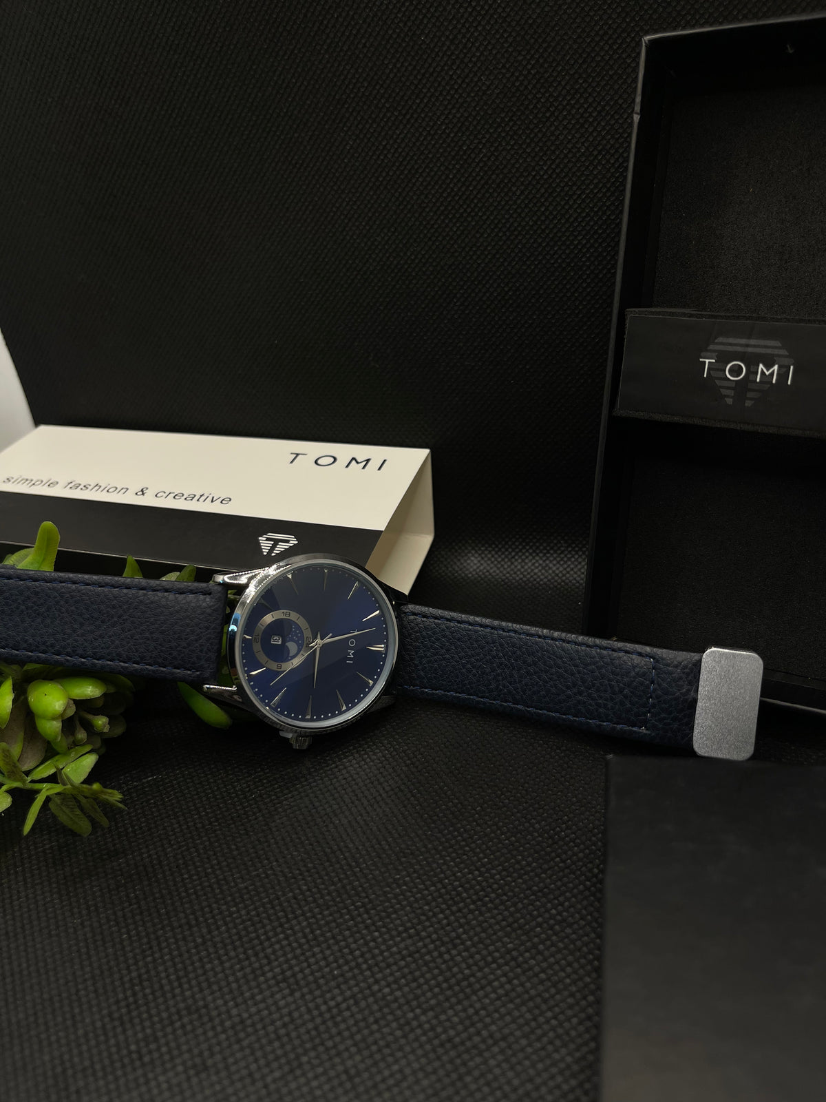 TOMI METALLIC BLUE DIAL WITH BLUE LEATHER STRAP IN MAGNETIC LOCK