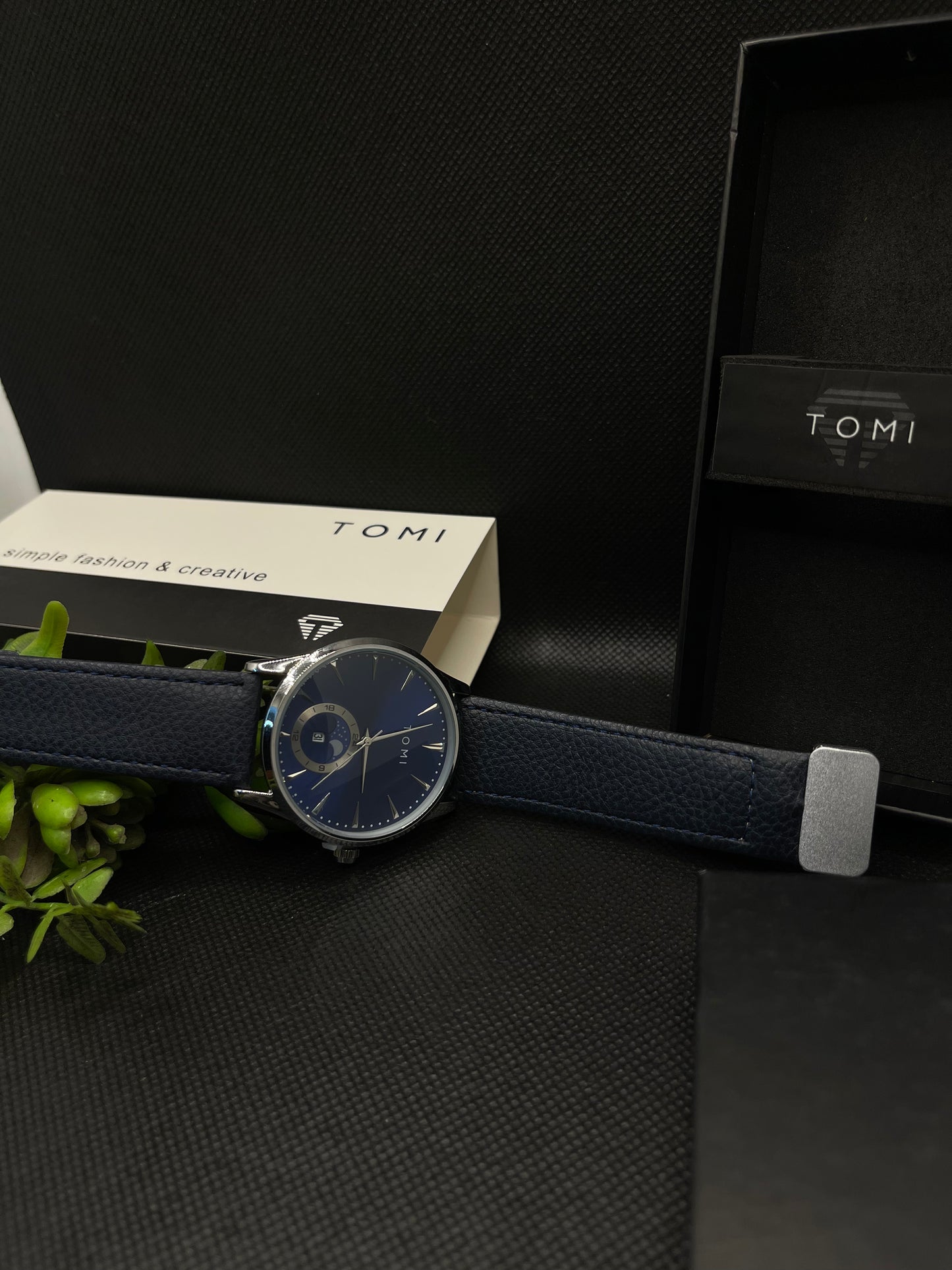 TOMI METALLIC BLUE DIAL WITH BLUE LEATHER STRAP IN MAGNETIC LOCK