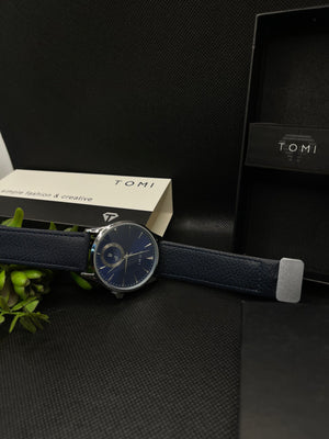 TOMI METALLIC BLUE DIAL WITH BLUE LEATHER STRAP IN MAGNETIC LOCK