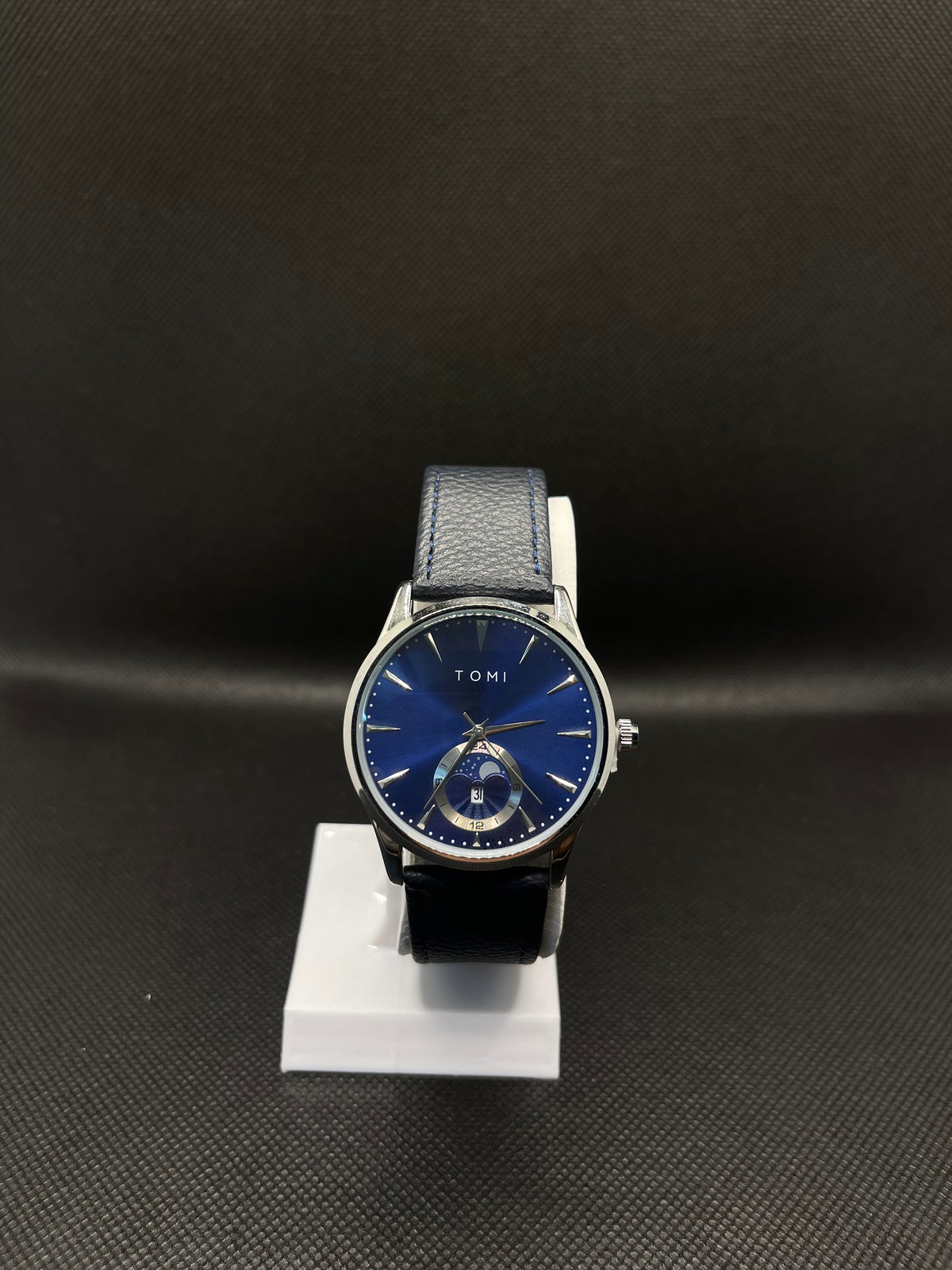 TOMI METALLIC BLUE DIAL WITH BLUE LEATHER STRAP IN MAGNETIC LOCK