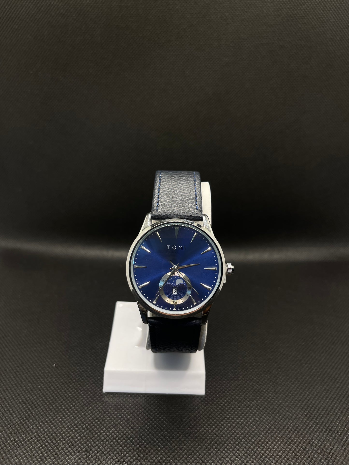 TOMI METALLIC BLUE DIAL WITH BLUE LEATHER STRAP IN MAGNETIC LOCK