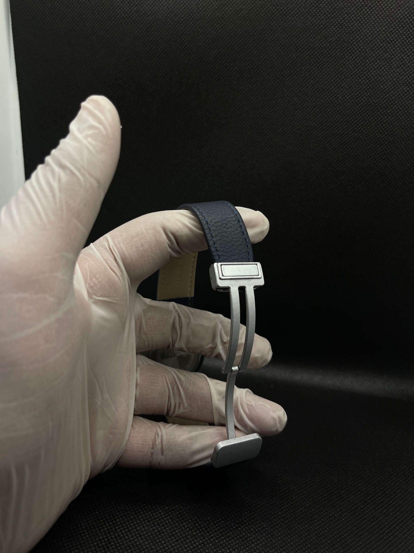 TOMI METALLIC BLUE DIAL WITH BLUE LEATHER STRAP IN MAGNETIC LOCK