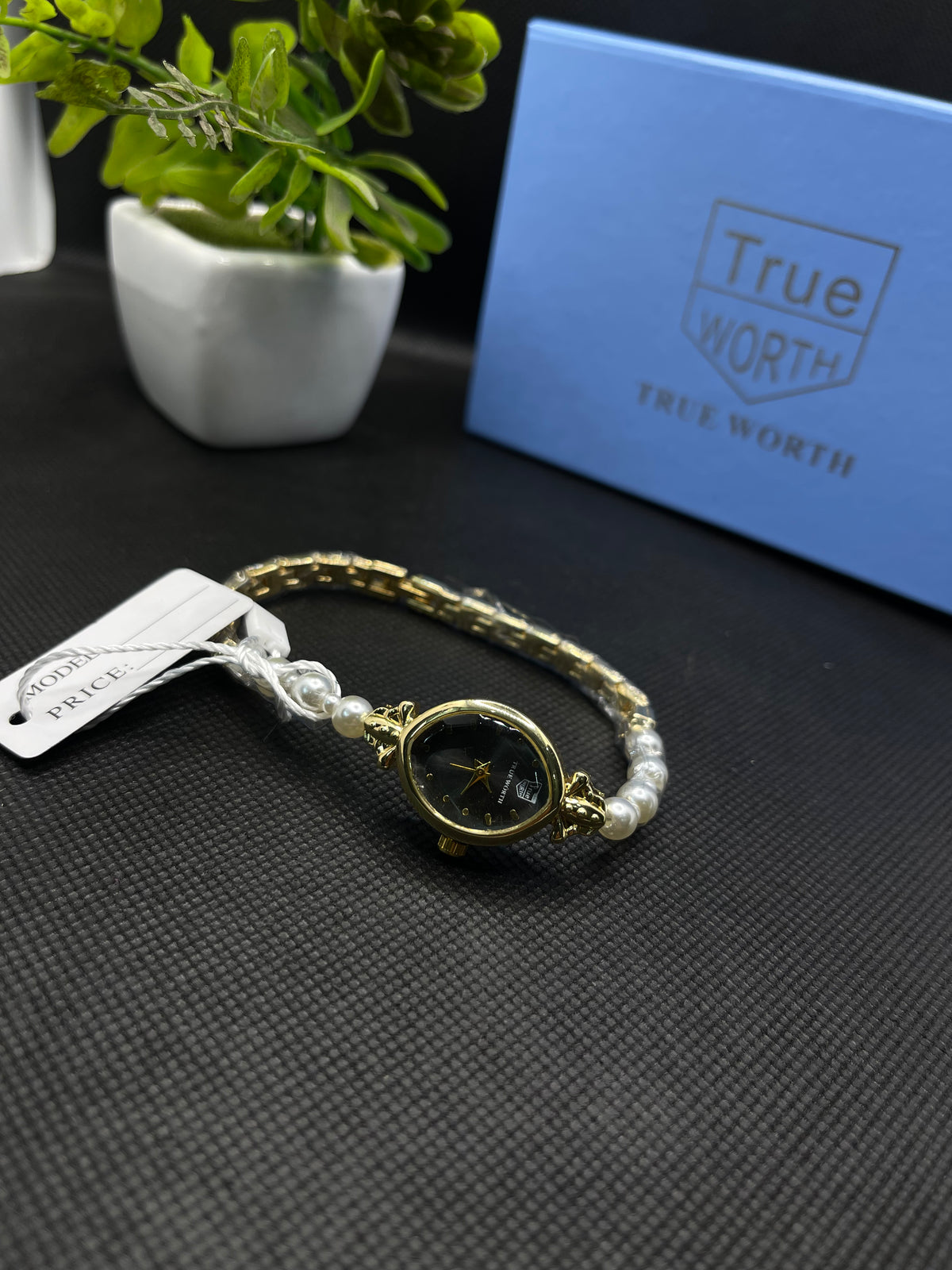 GOLD-TONE CASE AND BLACK DIAL WITH PEARL BRACELET WATCH FOR WOMEN