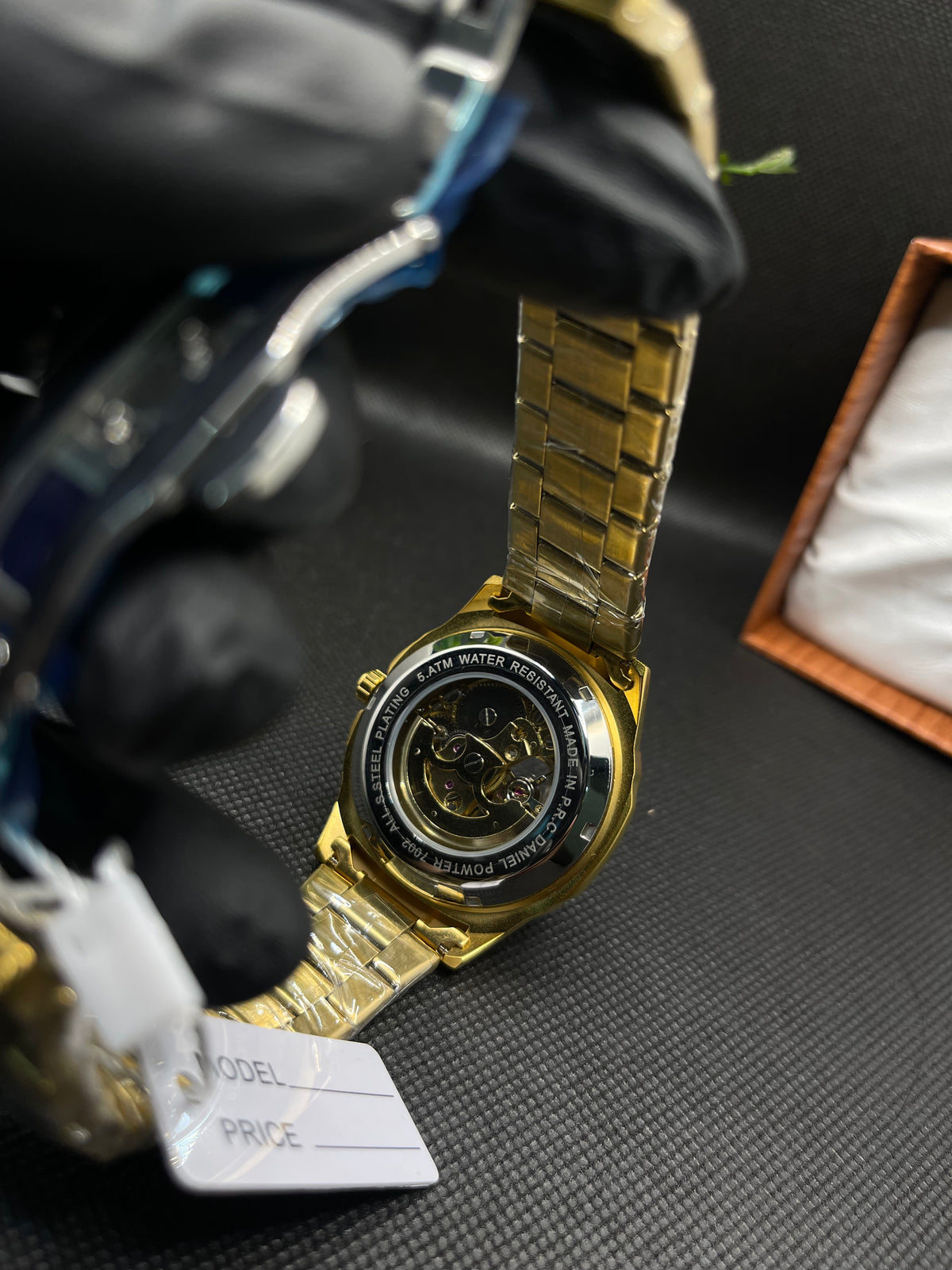 AUTOMATIC MECHANICAL GOLD WATCH WITH ROMAN COUNT SKELETON DIAL AND STAINLESS STEEL BAND