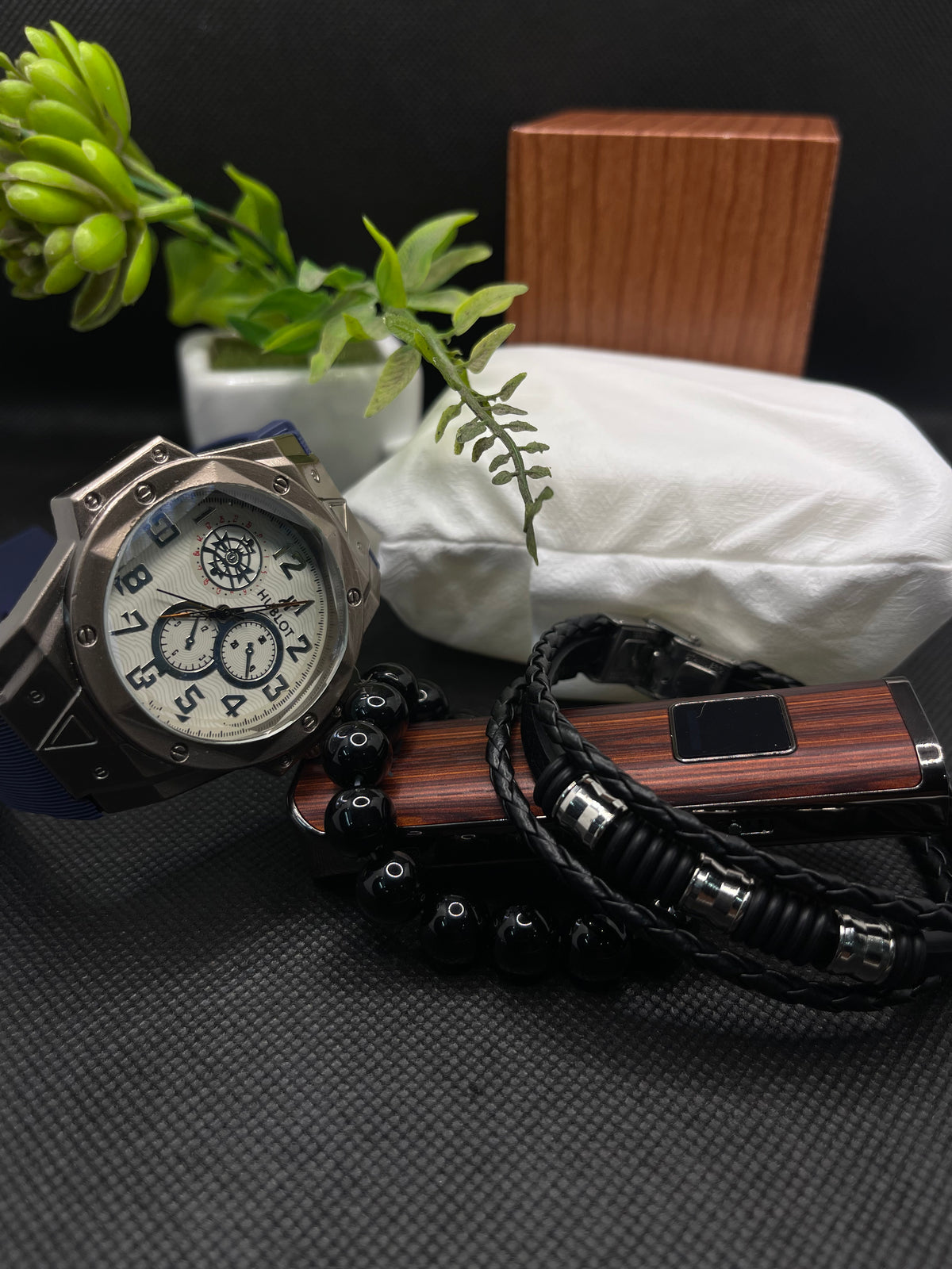 HB WHITE DIAL WITH SUBDIALS IN BLUE STRAP ALONG WITH BRACELET