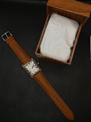 CARTI3R TANK MUST DE WHITE ROMAN DIAL AND BROWN LEATHER STRAP