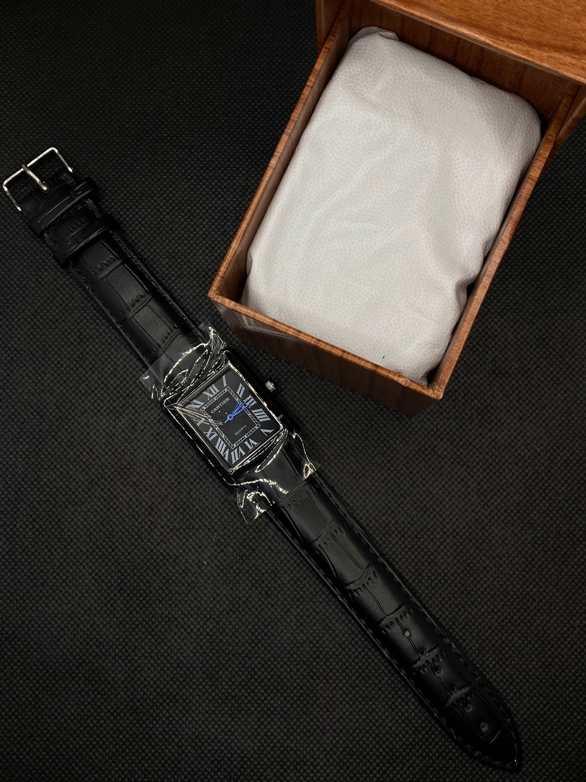 CARTI3R BLACK TANK BLACK ROMAN DIAL AND LEATHER STRAP